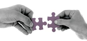 hands-with-jigsaw-puzzle